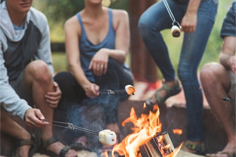 friends by a campfire