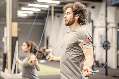 man and woman jumping rope at fitness gym at oakfield community center