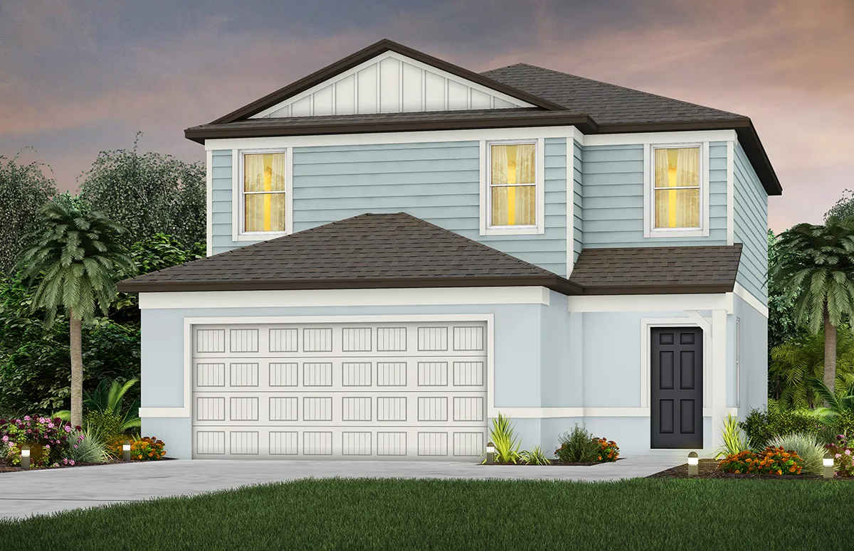 A two-story light blue house with a white garage door, black front door, and yellow-lit windows, surrounded by green lawn, palm trees, and small shrubs under a dusk sky.