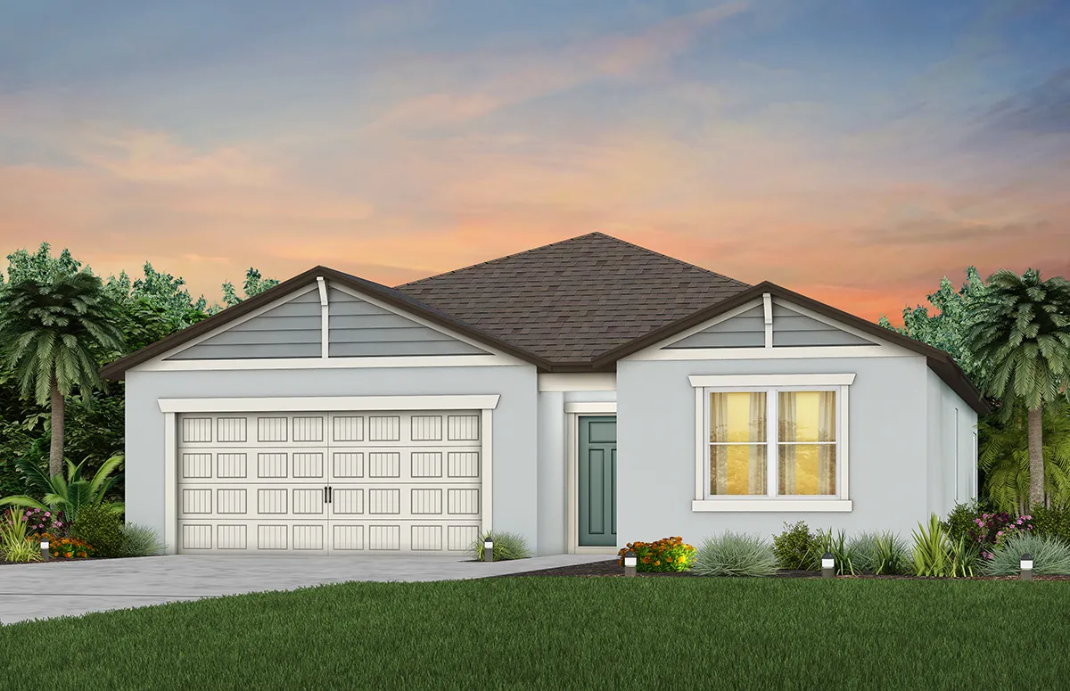 Single-story house with gray siding, a two-car garage, and a front yard with green grass and shrubs. Palm trees frame the scene, and the sky is colorful at sunset.