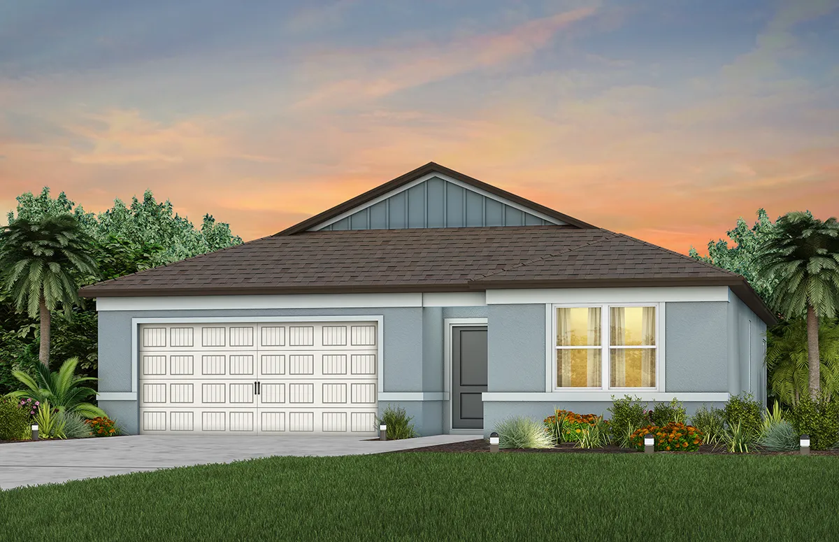 A modern single-story house with a gray exterior, white garage door, large front window, and landscaped yard, set against a backdrop of trees and a colorful sunset sky.