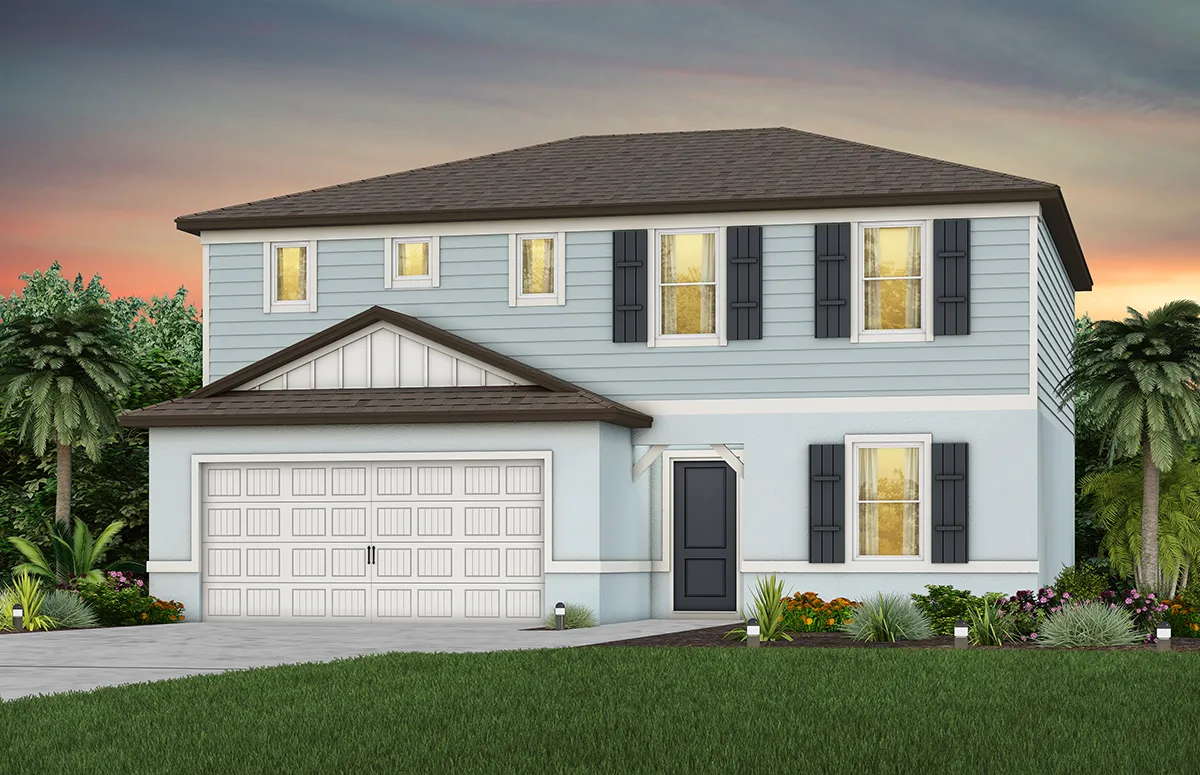 A two-story light blue house with dark shutters, a gabled roof, a two-car garage, and a neatly landscaped yard, set against a colorful sunset sky with palm trees in the background.