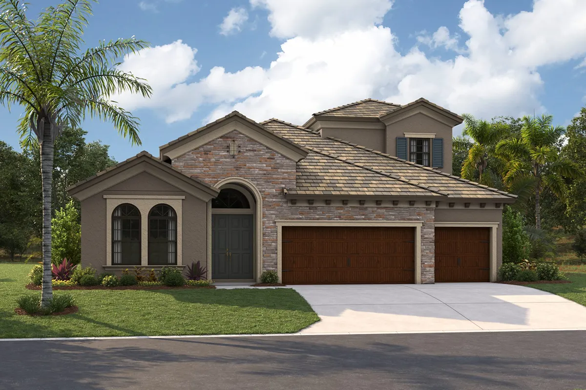A modern two-story house with a stone and stucco exterior, three-car wooden garage doors, arched windows, and a well-kept lawn with palm trees and shrubs under a partly cloudy sky.