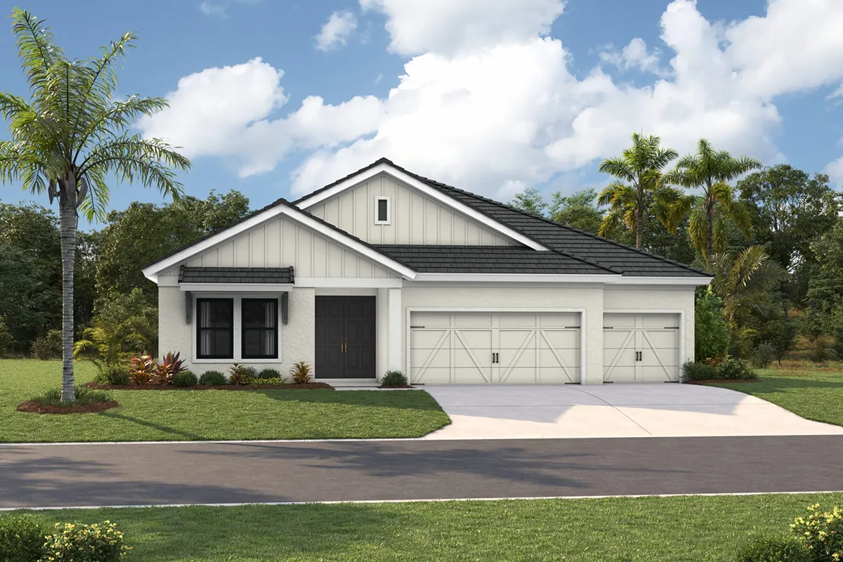 Single-story modern house with white exterior, black roof, double front doors, and a two-car garage. The front yard is landscaped with small shrubs and palm trees, set against a backdrop of greenery and blue sky with clouds.