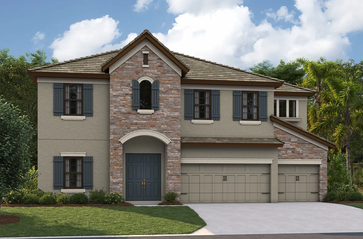 Two-story house with a stone and stucco exterior, gray shutters, tall windows, and a dark double front door. The home has a three-car garage and is surrounded by greenery under a partly cloudy sky.