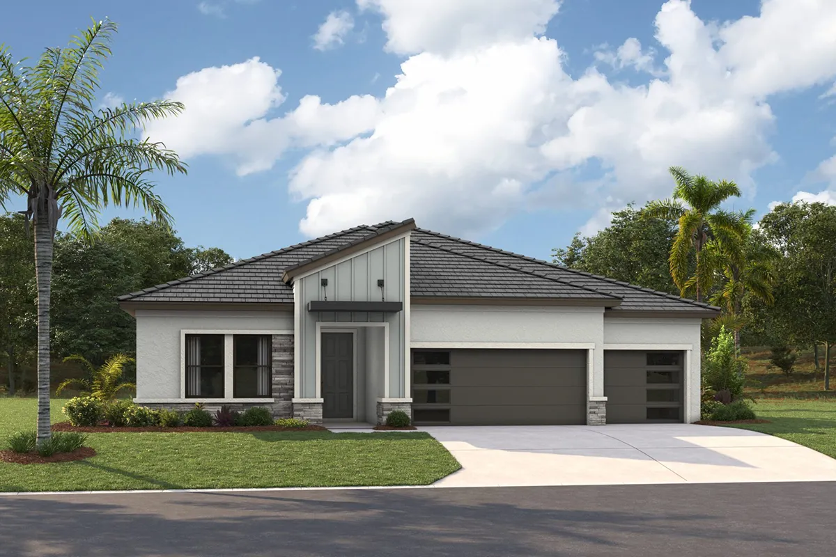 A modern single-story house with a dark gray roof, large windows, double garage doors, and a well-kept lawn with palm trees under a partly cloudy sky.
