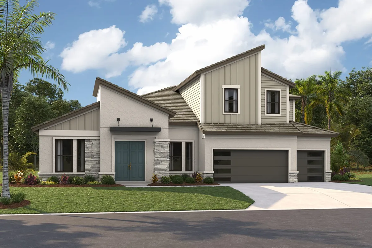 Modern two-story house with gray and beige exterior, large windows, double front doors, a three-car garage, stone accents, a manicured lawn, and tropical landscaping under a partly cloudy sky.