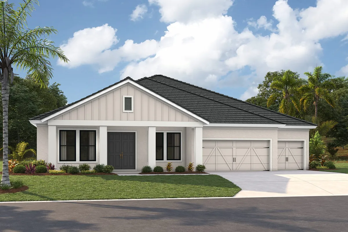 A modern single-story house with light gray siding, black roof, double front doors, and a three-car garage. The front yard has green grass, small plants, and a palm tree, with a clear sky in the background.