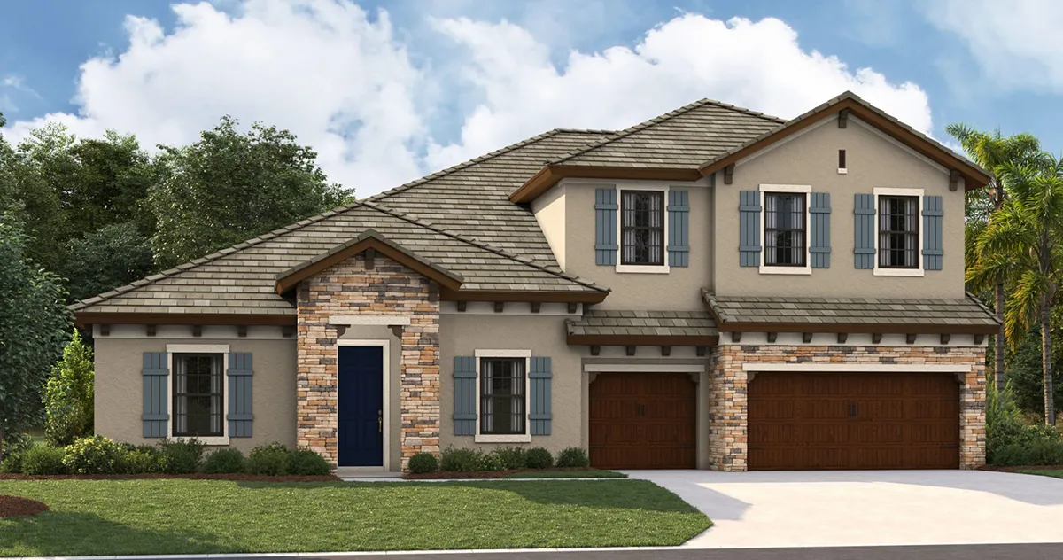 A two-story suburban house with beige walls, blue shutters, stone accents, and a dark blue front door. It has a three-car garage with wooden doors, a manicured lawn, and is surrounded by trees under a partly cloudy sky.