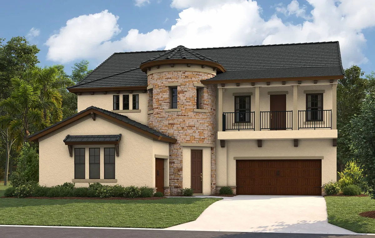 Two-story beige house with stone turret, dark roof, and wooden garage doors. Features arched entry, multiple windows, balcony, and a manicured lawn with shrubs, set against a backdrop of trees and a partly cloudy sky.