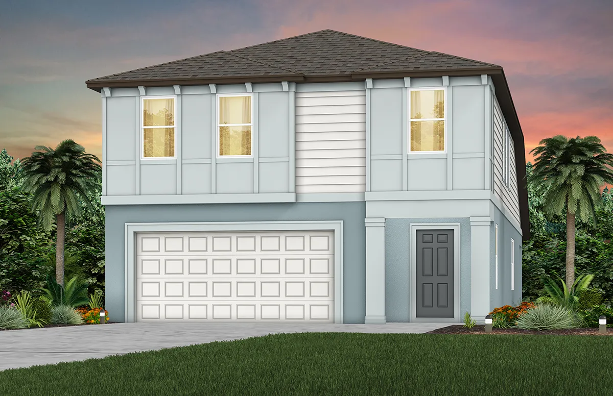 A two-story modern house with a double garage, gray siding, large windows, and a dark front door, surrounded by green lawn, plants, and palm trees at sunset.