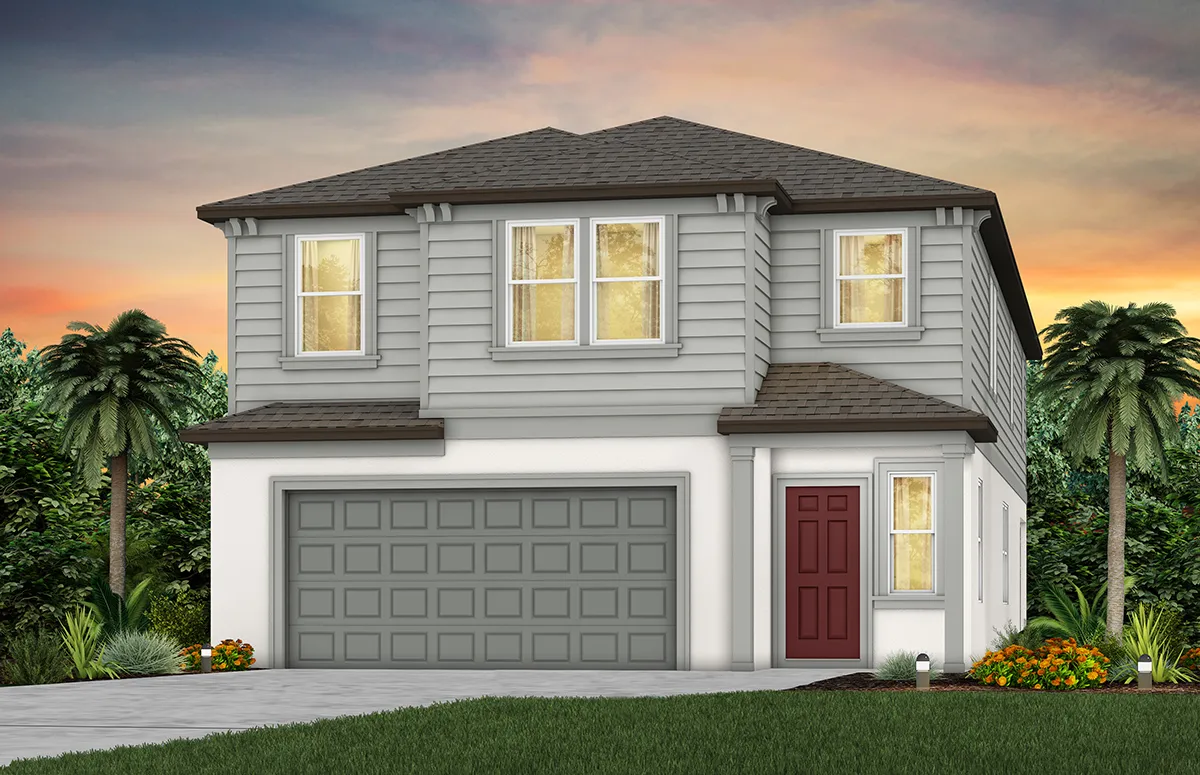 Two-story house with gray siding, a double garage, and a red front door. The house is surrounded by palm trees and landscaping, with a driveway and front lawn at sunset.