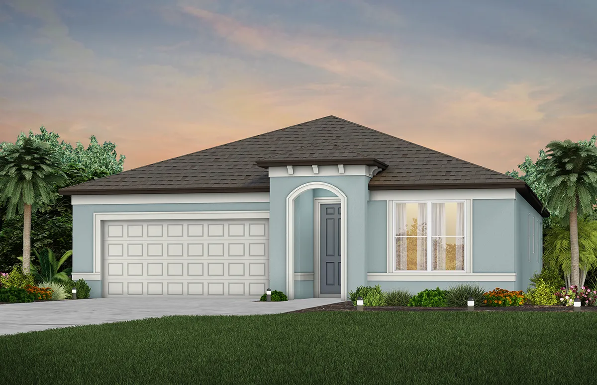 Single-story, light blue house with a dark shingle roof, attached two-car garage, central front door, large front window, and landscaped yard with green grass, plants, and palm trees under a dusk sky.